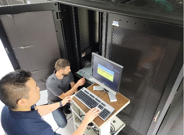 Technicians installing new servers