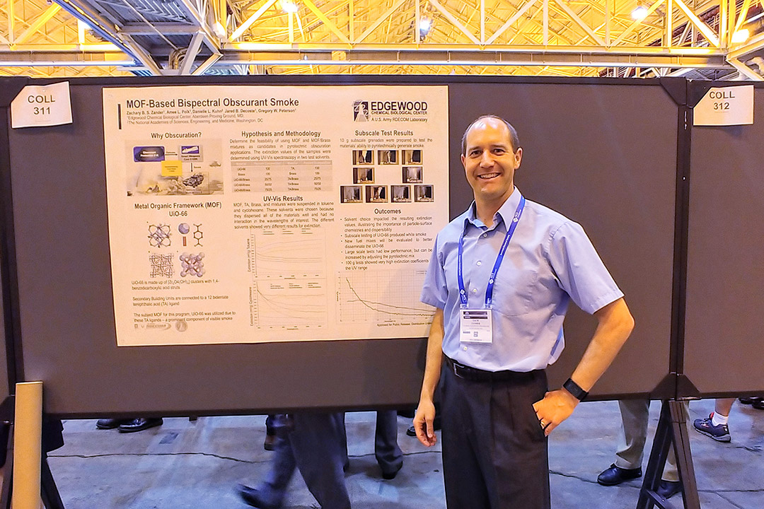 ECBC scientist Zachery Zander in in front of his poster at the 255th annual meeting of the American Chemical Society in New Orleans on March 18.