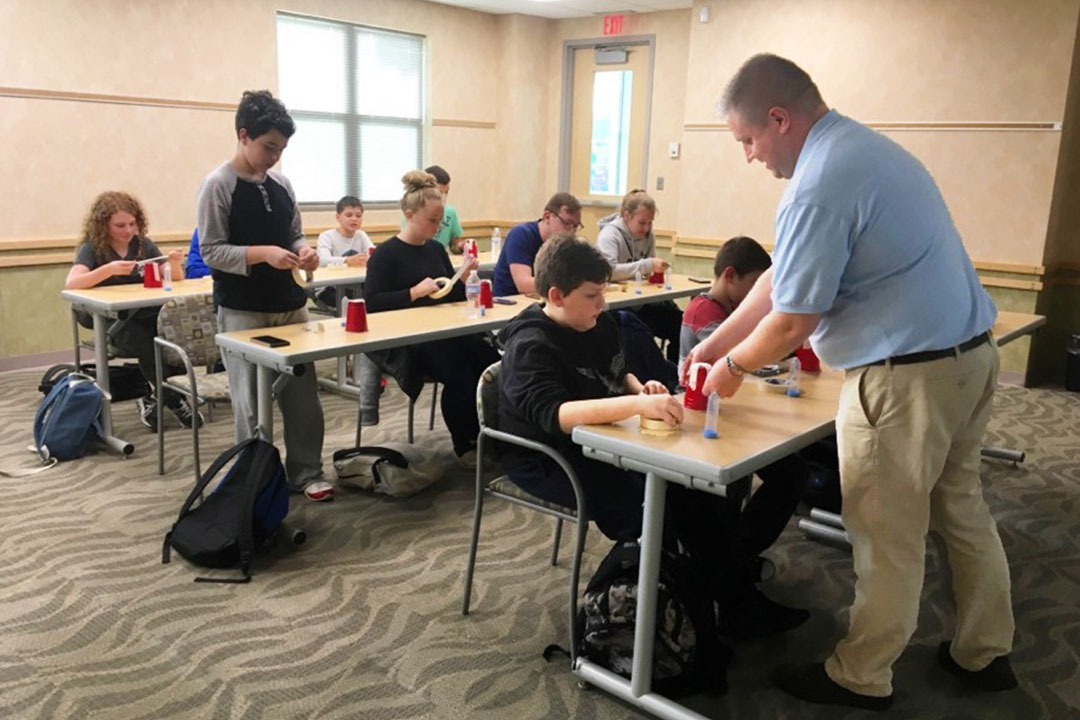 STEM program manager for CCDC Chemical Biological Center, Casey Weininger, leads a science class for homeschool students at CCPL. (Photo credit: CCDC Chemical Biological Center)