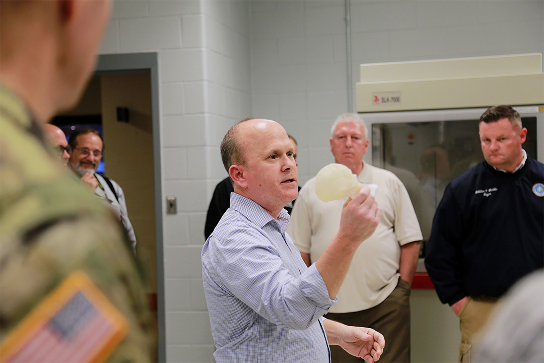 Rick Moore explains how 3D printers at the Center have aided in forensic investigations. (Photo credit: CCDC Chemical Biological Center photo by Shawn Nesaw)