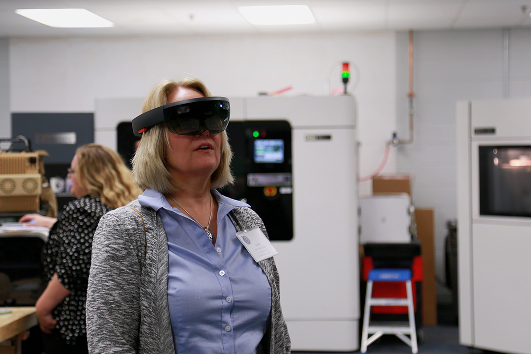 Maryland General Assembly, House Minority Whip, Kathy Szeliga experiences an augmented reality program specially designed by the Center for Army training. (Photo credit: CCDC Chemical Biological Center photo by Shawn Nesaw) 