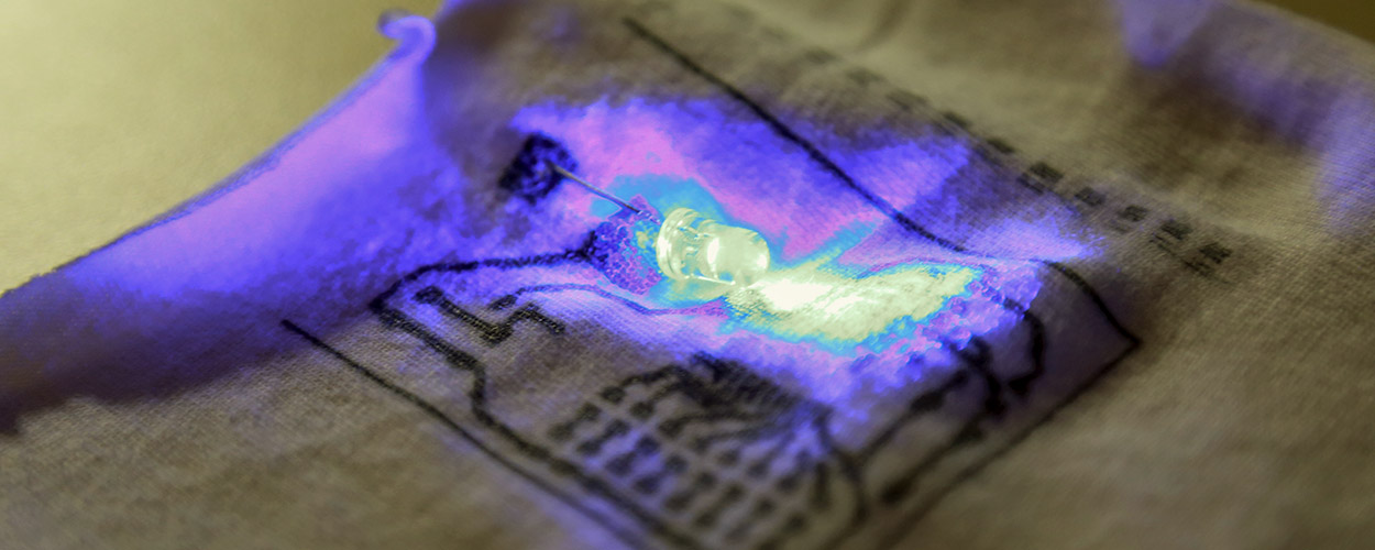 Conductive, flexible, silver ink circuitry printed on fabric will allow LEDs to be embedded within uniforms. The light initiates a chemical reaction that destroys chemical warfare agents, but is not visible to enemy forces.