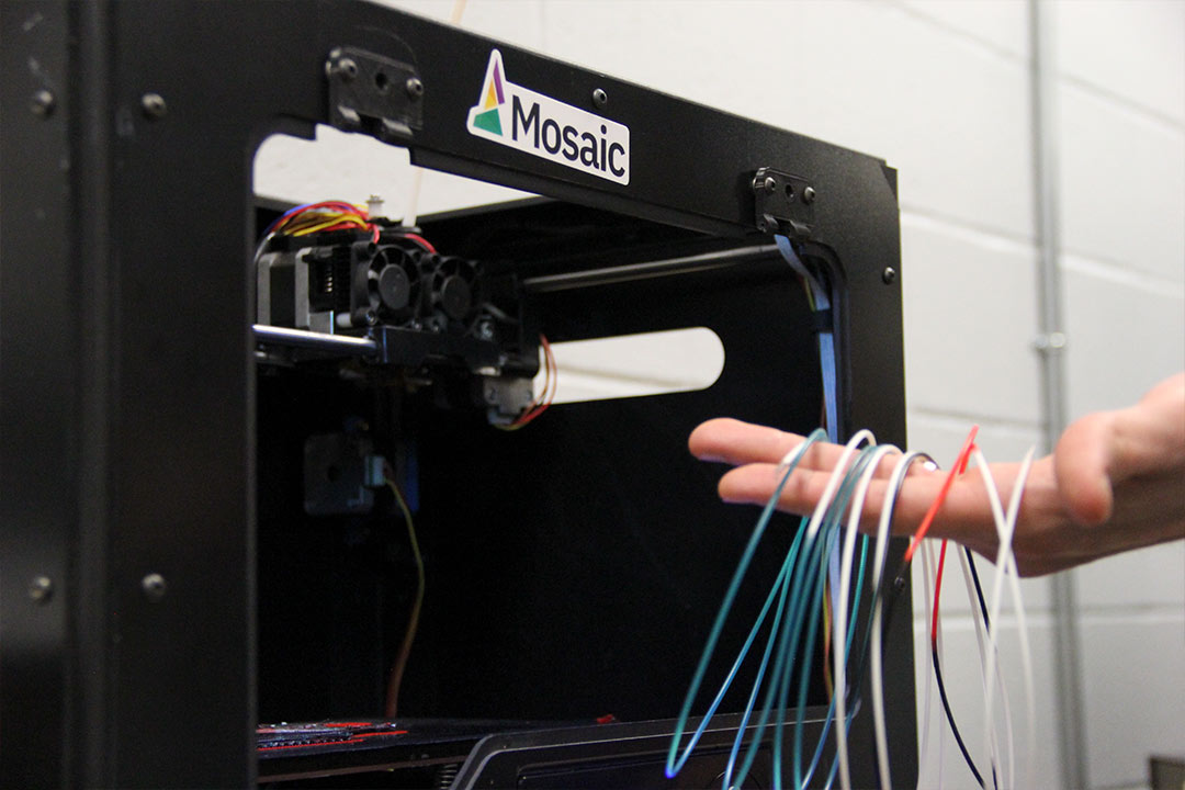 The multi-material filament system allows printing of up to four different materials at once by calculating how much material is needed for each material break per layer.