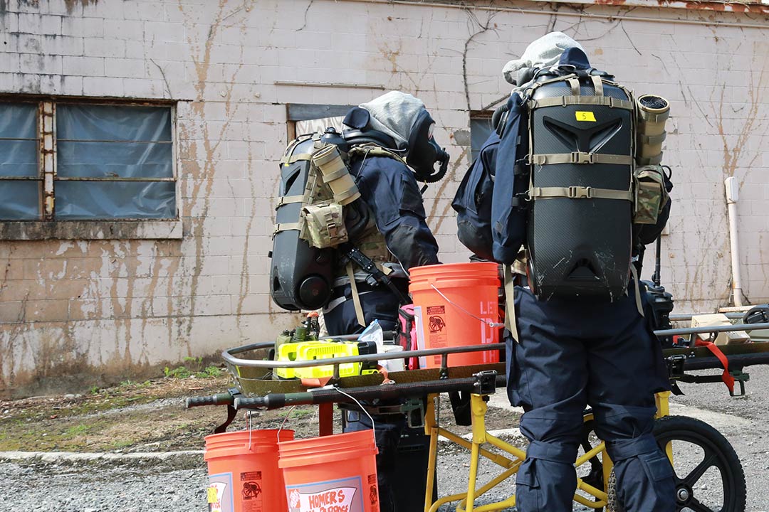 Members of the West Virginia National Guard 35th Civil Support Team wear prototypes of the CCDC Chemical Biological Center respiration protection system in a side-by-side comparison test with current respiratory protection technology.
