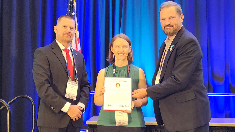 DEVCOM CBC biologist Alena Calm received the Joseph D. Wienand NDIA CBRN Division STEM Excellence Award at the NDIA CBRN Defense Conference in Baltimore, Maryland on July 26, 2023. (Photo by NDIA)